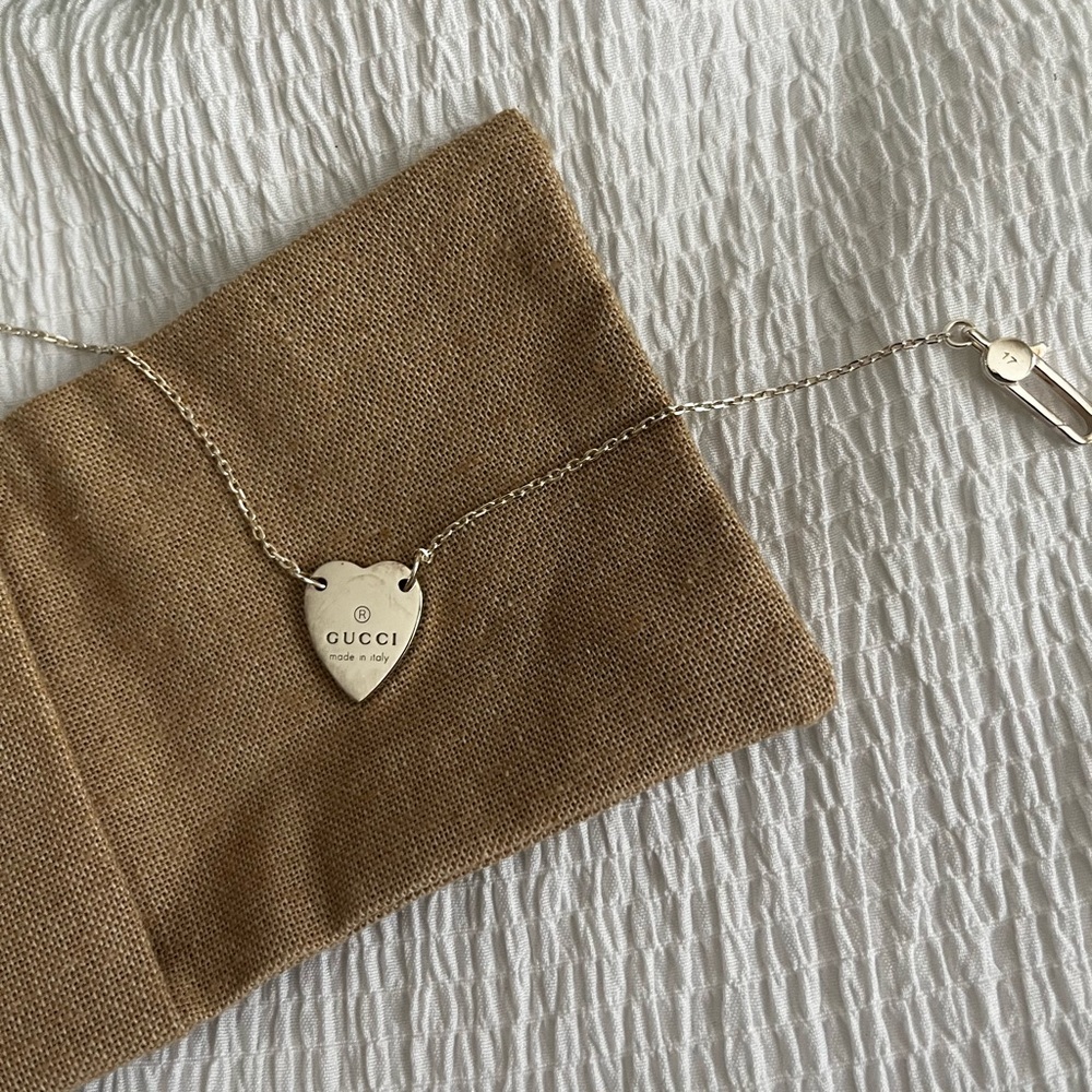 Gucci sterling silver engraved heart bracelet